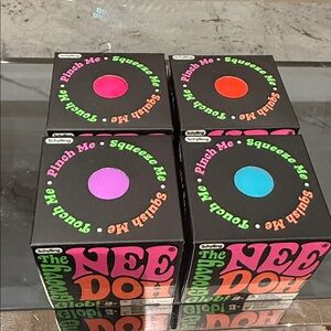 Schylling The Nee Doh Colorful Stress Ball Toy - Pink, Orange, Purple, Blue